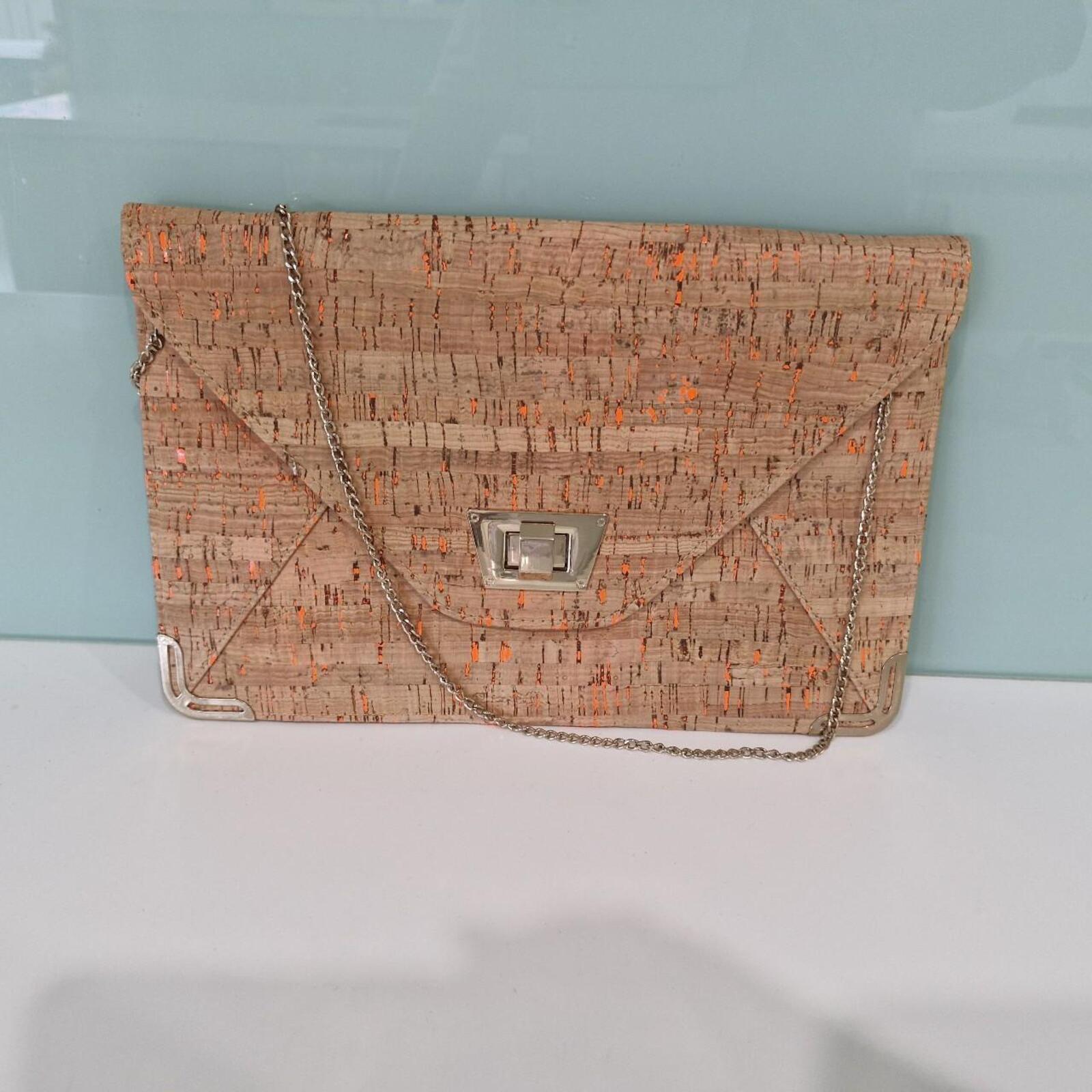 Tan and orange cork clutch bag with gold chain strap