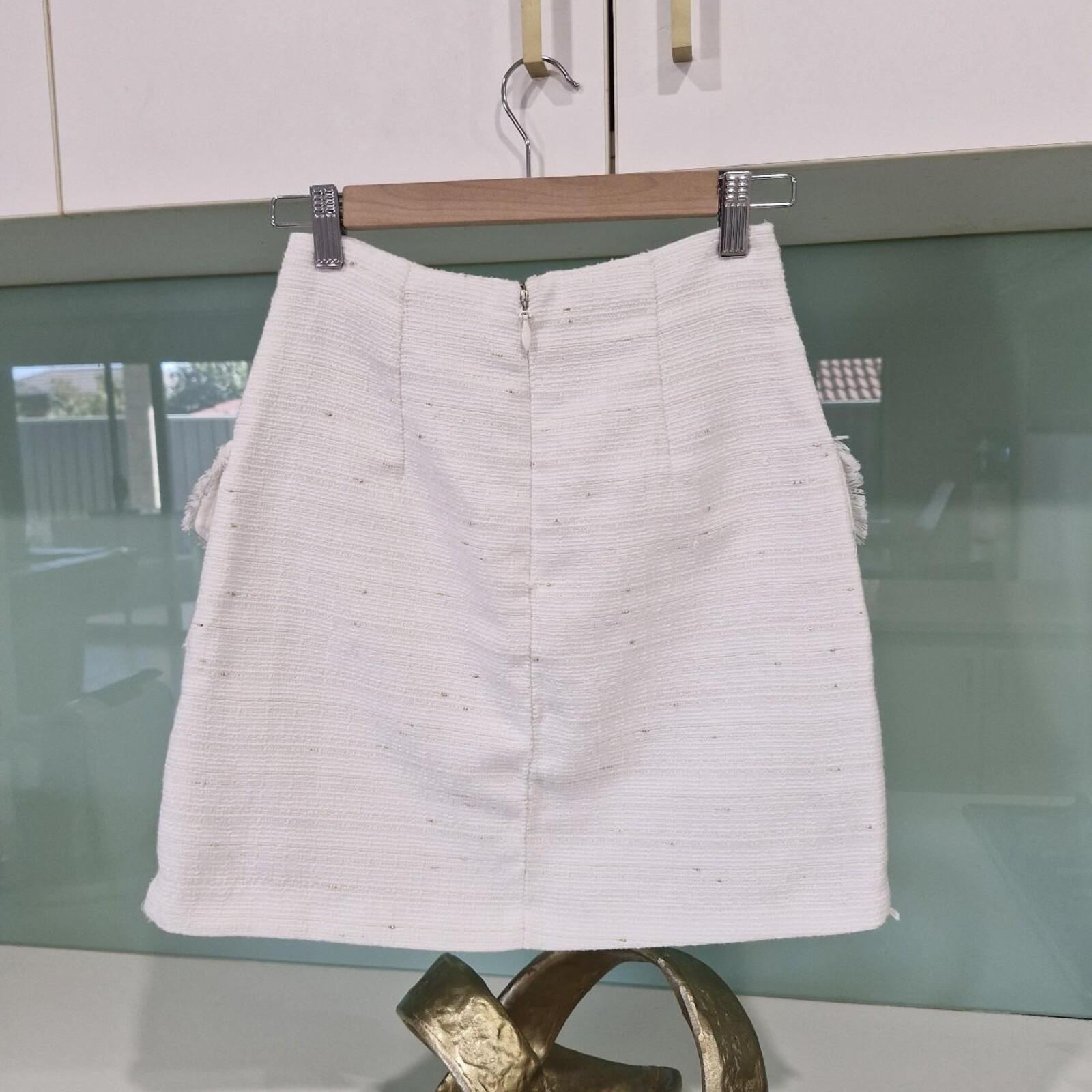 Sheike white mini skirt with pockets
