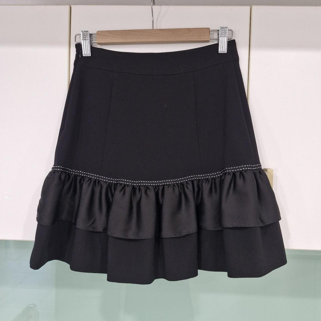 REVIEW Black mini skirt with ruffle hem and white stitching