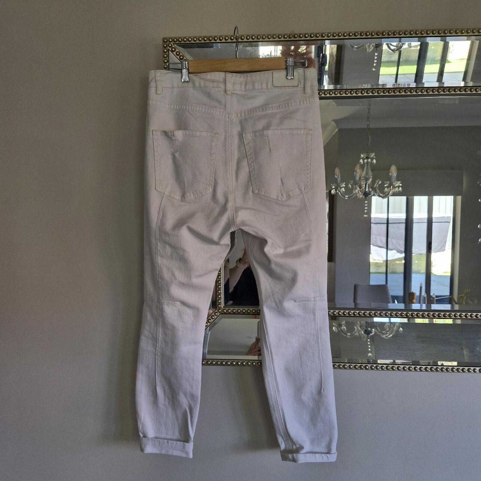 Decjuba White high-waisted ripped denim jeans 10