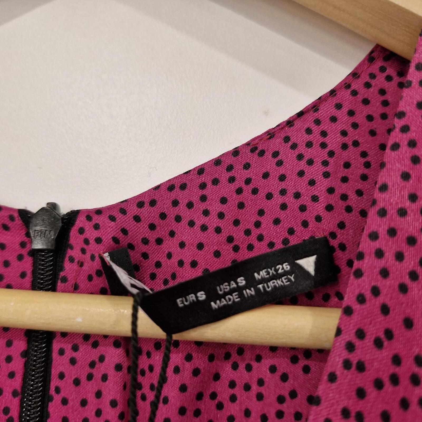 Zara Pink polka dot mini dress with ruched detail and long sleeves.