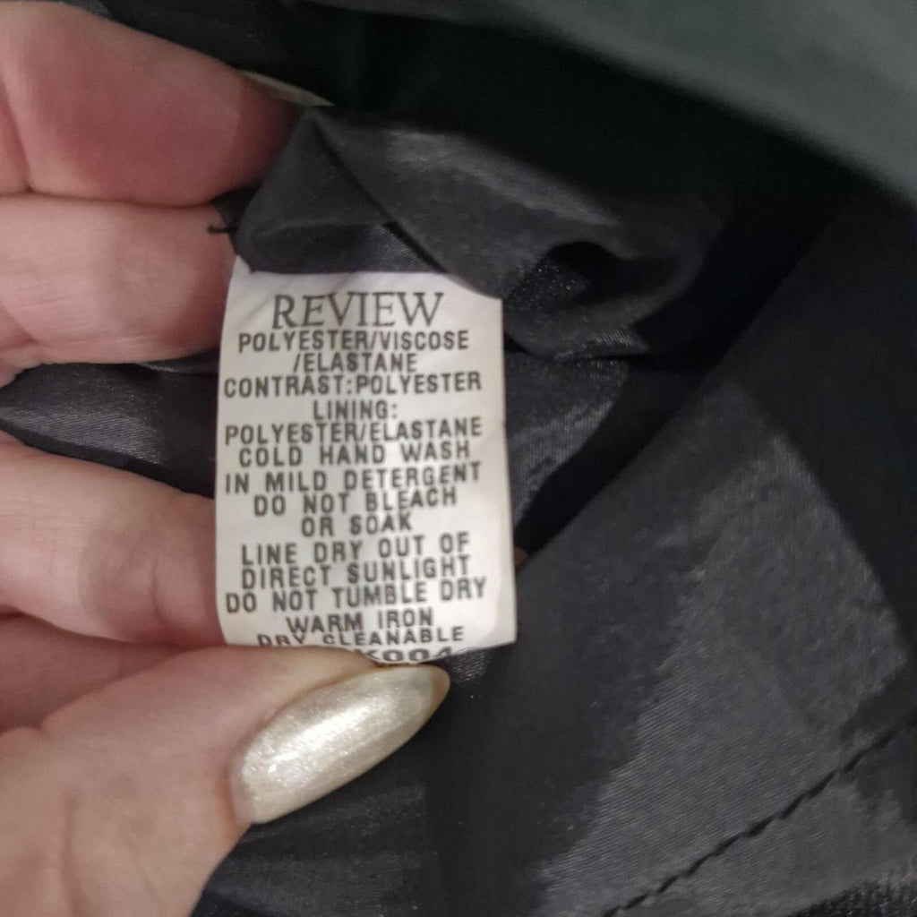 REVIEW Black mini skirt with ruffle hem and white stitching