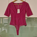 Hot pink Guess bodysuit M