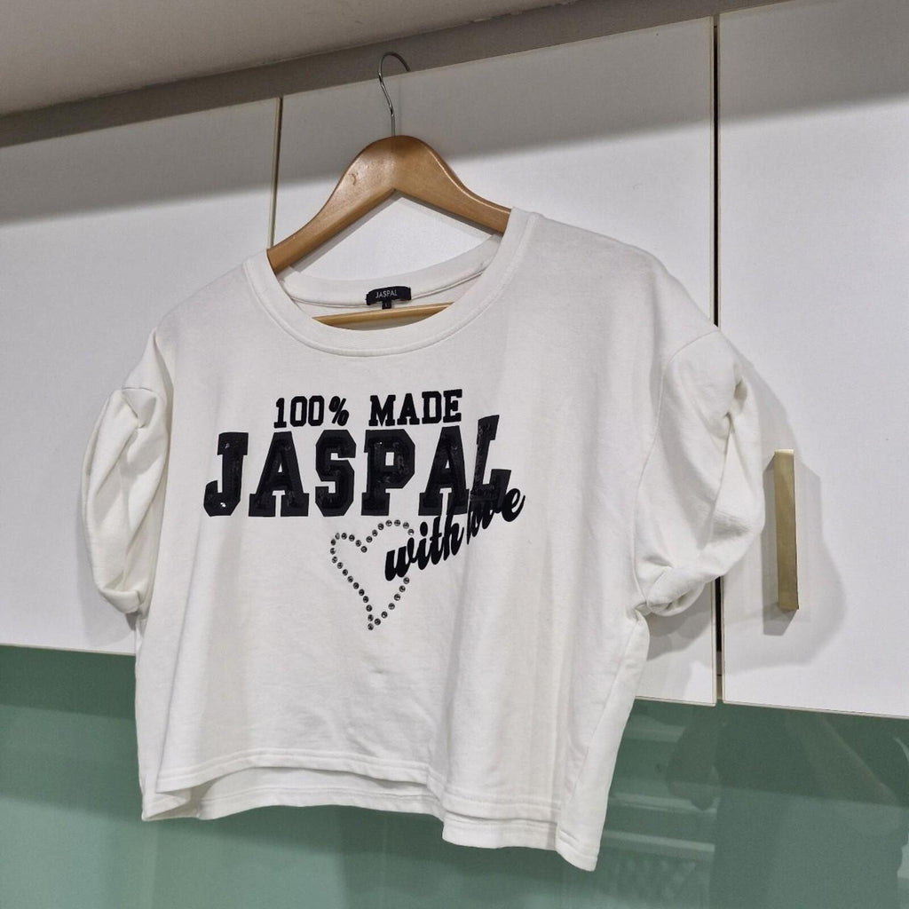 Jaspal white cropped top with black lettering and heart detail.