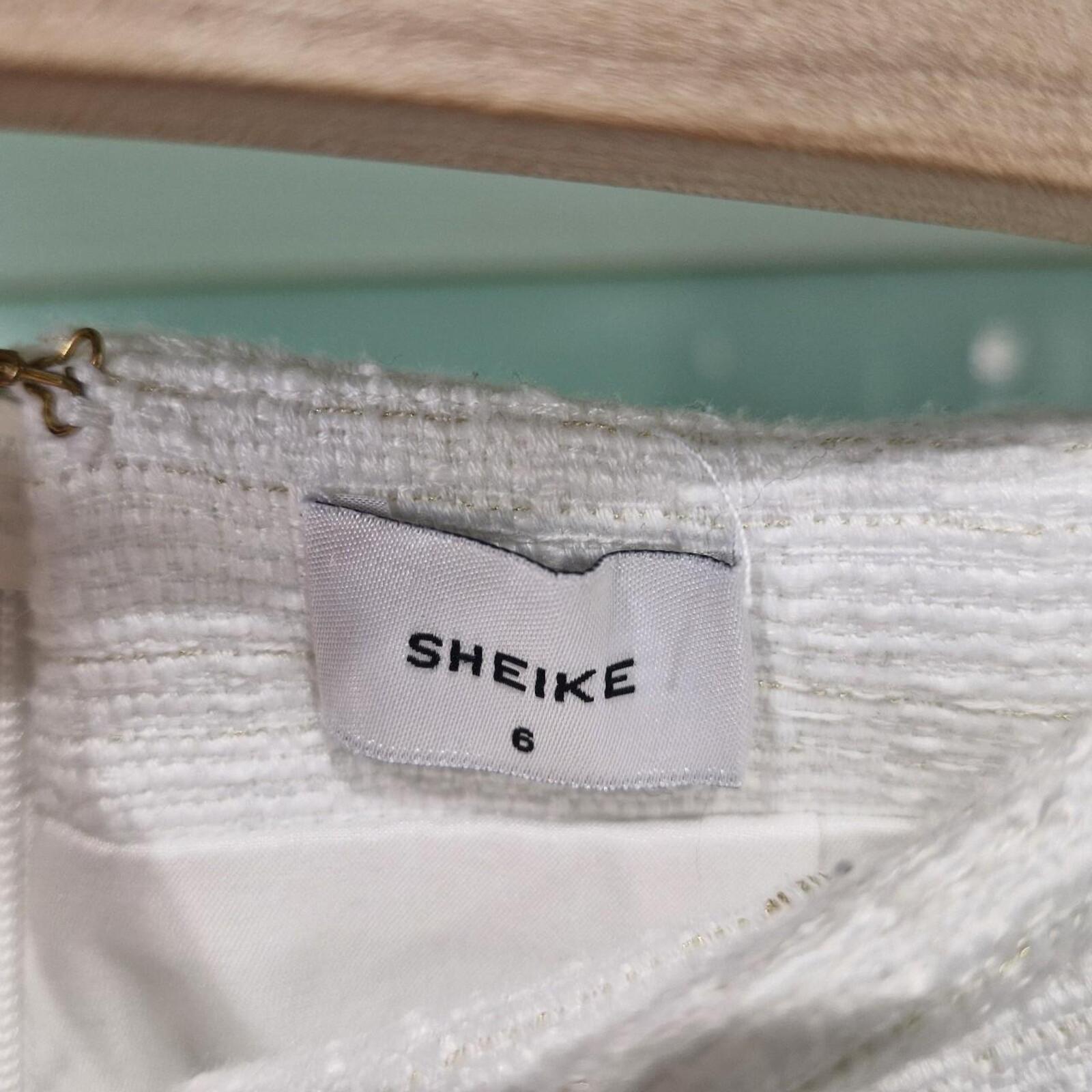 Sheike white mini skirt with pockets