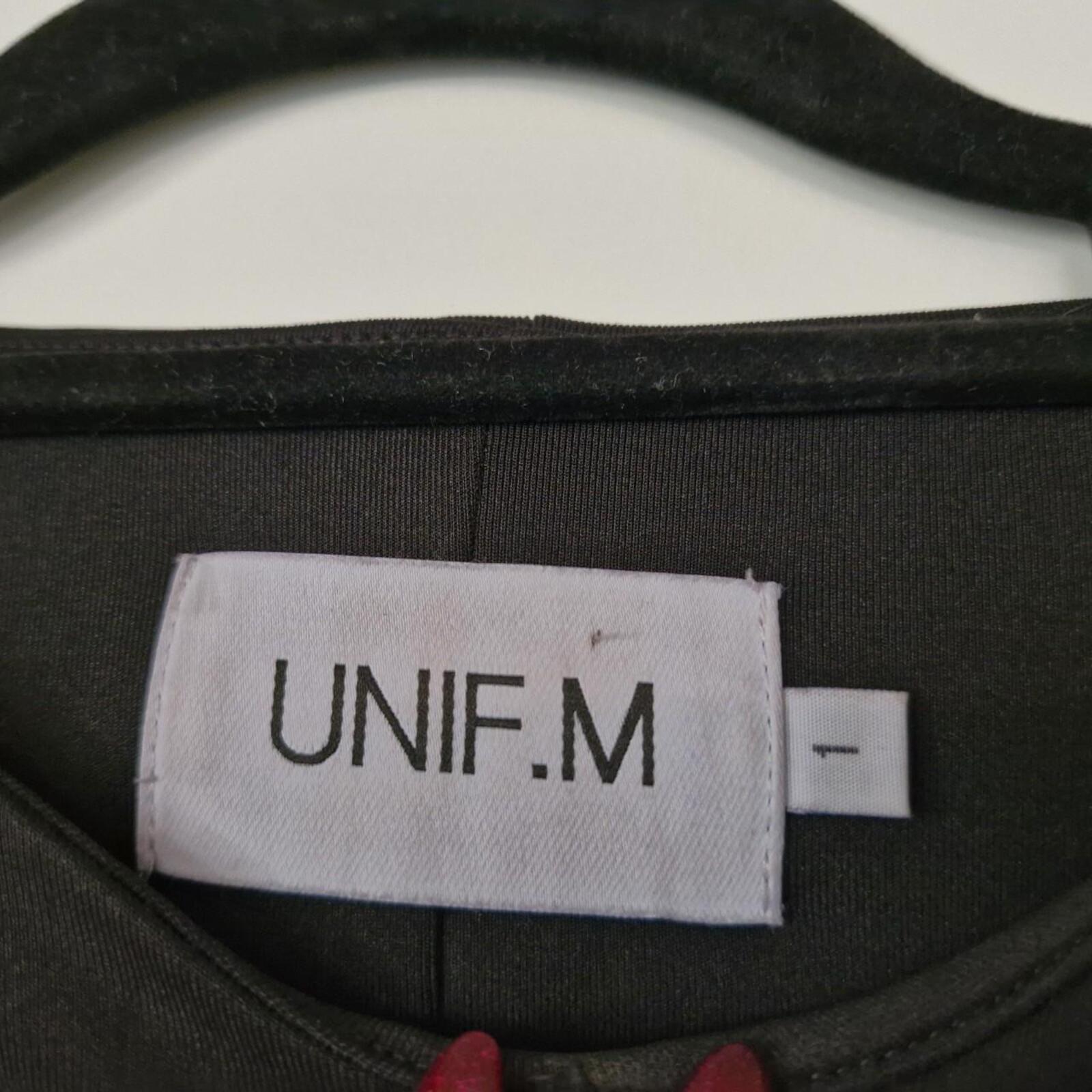 UNF.M black mini dress with cut out detail
