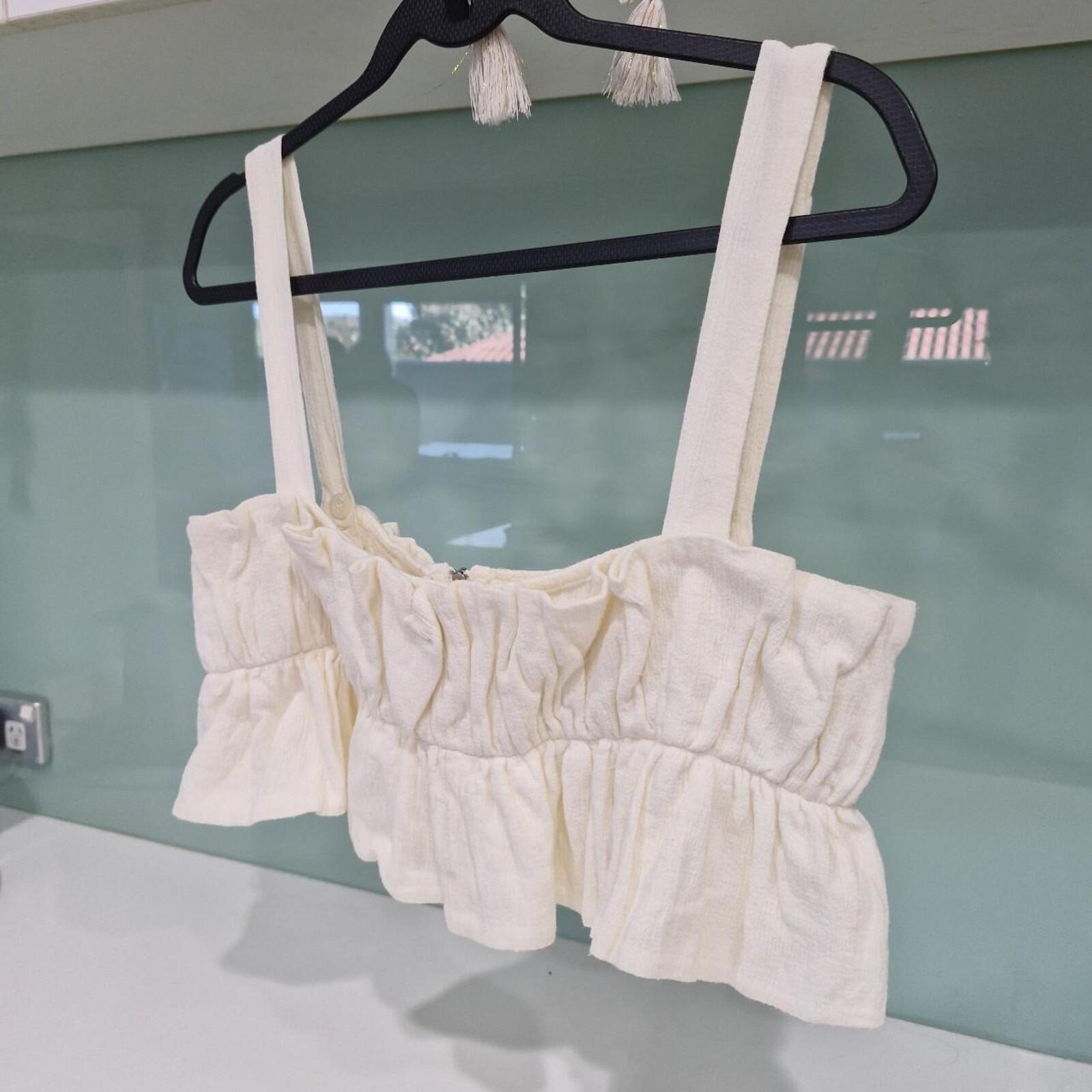 STEELE The Label cream ruffle crop top