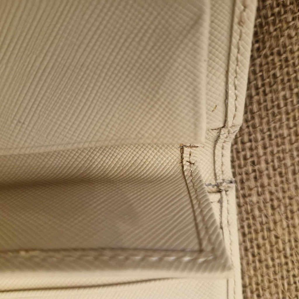 Oroton beige card wallet / purse with silver hardware