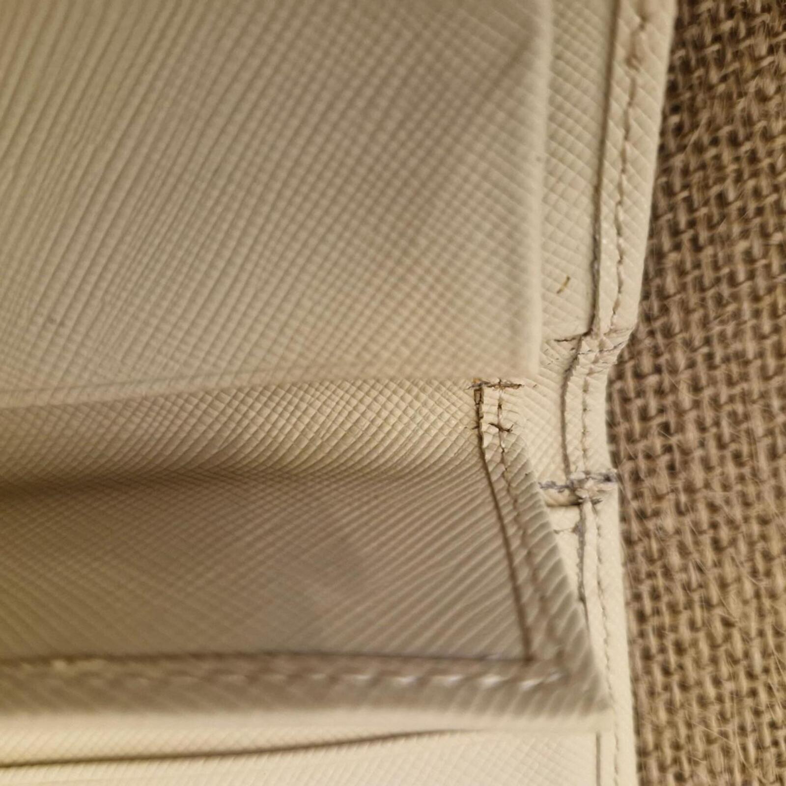 Oroton beige card wallet / purse with silver hardware