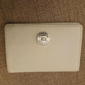 Oroton beige card wallet / purse with silver hardware