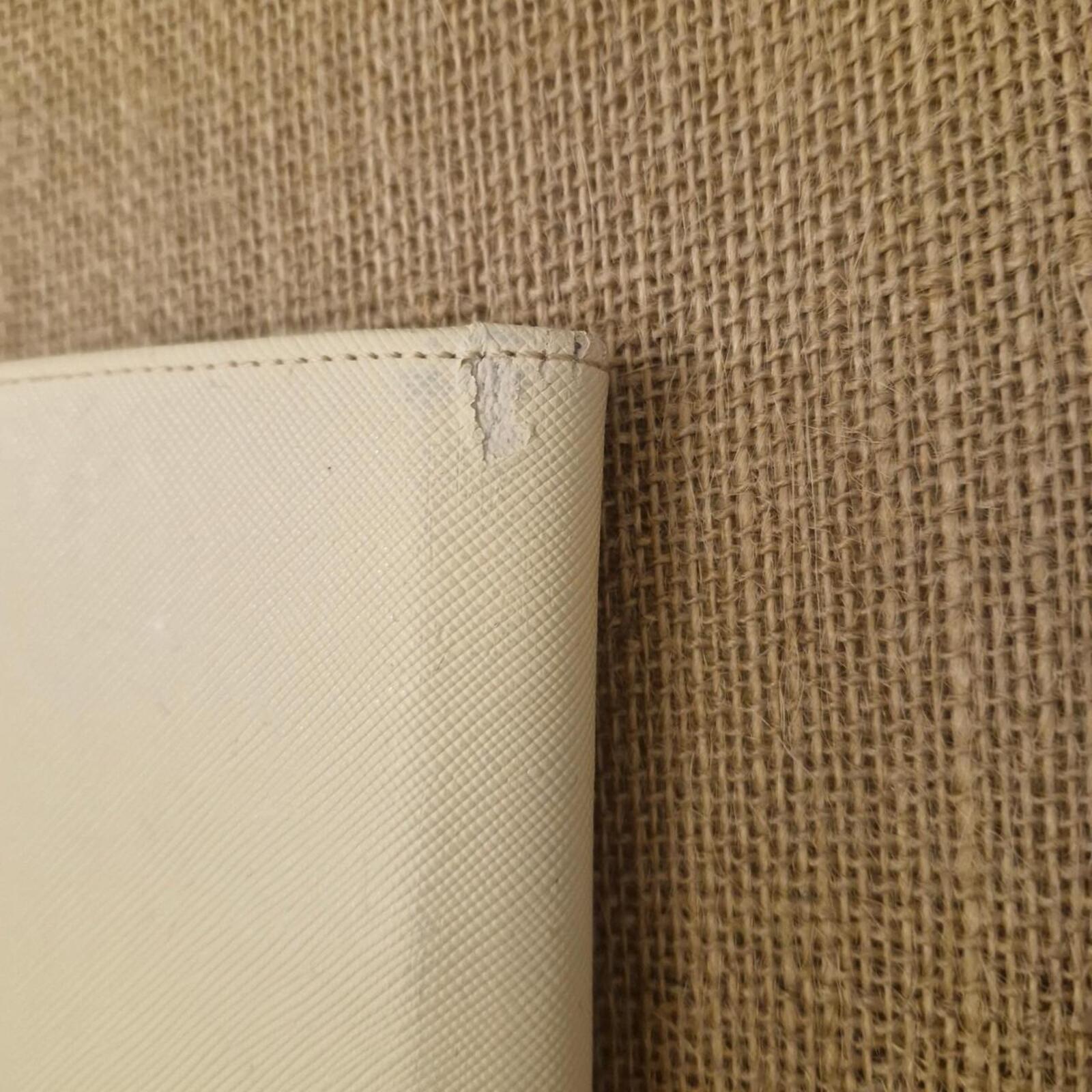 Oroton beige card wallet / purse with silver hardware