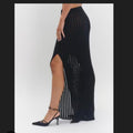 Black maxi skirt with side slit and mesh overlay